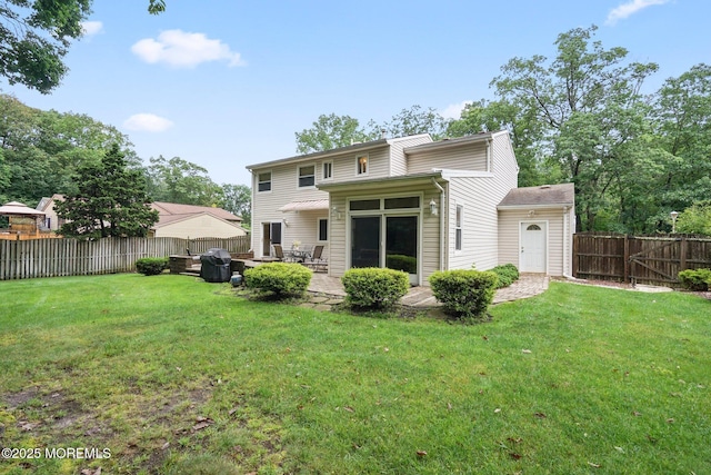 11 Hazelwood Ct, Howell, NJ 07731 - rear view of house with a patio and a fenced backyard