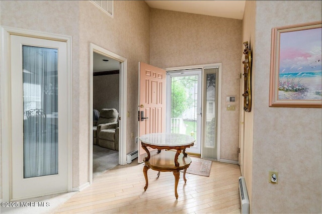 2331 Kira Ct, Toms River, NJ 08755 - entryway with a baseboard radiator and light wood-style floors