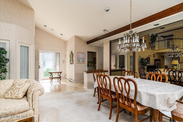 2331 Kira Ct, Toms River, NJ 08755 - dining room featuring a chandelier, high vaulted ceiling, and light carpet