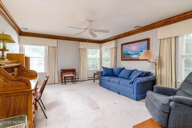 2331 Kira Ct, Toms River, NJ 08755 - living area with wallpapered walls, ornamental molding, plenty of natural light, a ceiling fan, and light carpet