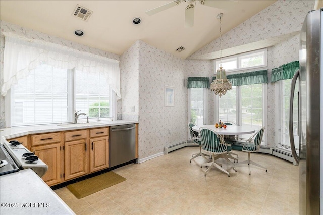 2331 Kira Ct, Toms River, NJ 08755 - kitchen with stainless steel dishwasher, wallpapered walls, vaulted ceiling, light countertops, and healthy amount of natural light