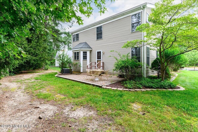 2331 Kira Ct, Toms River, NJ 08755 - rear view of house featuring a lawn