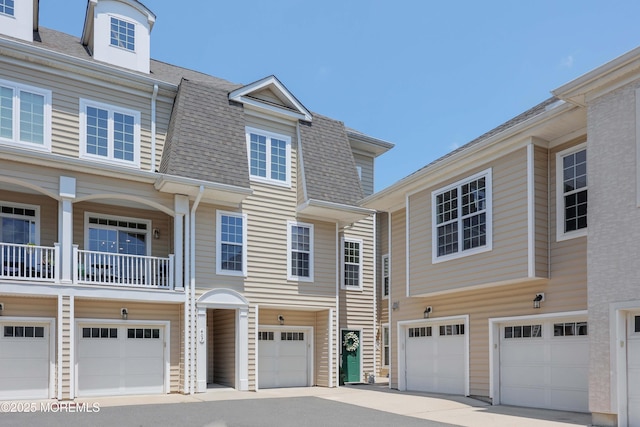 408 April Way, Middletown, NJ 07748 - view of front of house with a shingled roof and an attached garage
