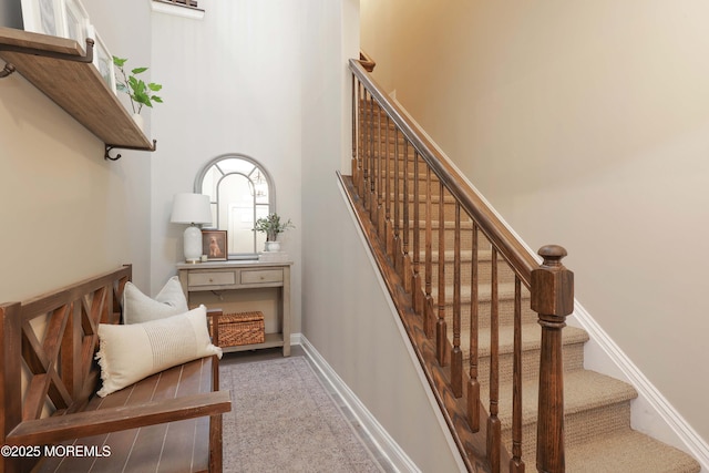408 April Way, Middletown, NJ 07748 - staircase featuring carpet flooring and a high ceiling
