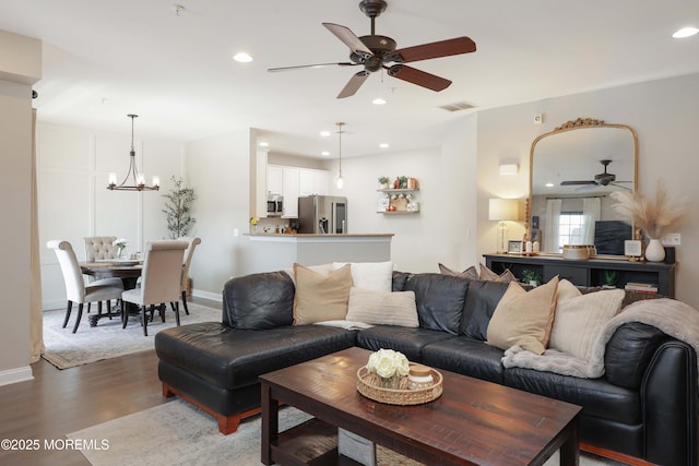 408 April Way, Middletown, NJ 07748 - living area with a ceiling fan, dark wood-style flooring, a chandelier, and recessed lighting
