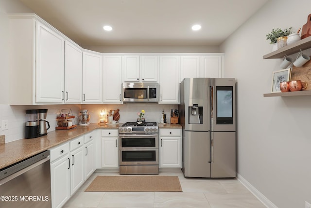 408 April Way, Middletown, NJ 07748 - kitchen featuring stainless steel appliances, tasteful backsplash, open shelves, white cabinets, and recessed lighting