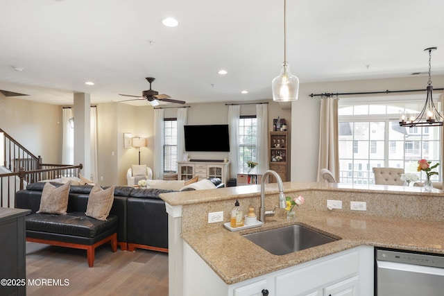 408 April Way, Middletown, NJ 07748 - kitchen with stainless steel dishwasher, open floor plan, light wood-style flooring, a ceiling fan, and recessed lighting