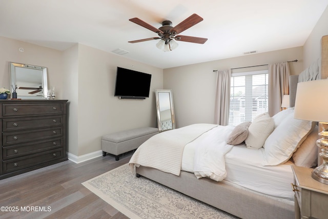 408 April Way, Middletown, NJ 07748 - bedroom with light wood-type flooring and a ceiling fan