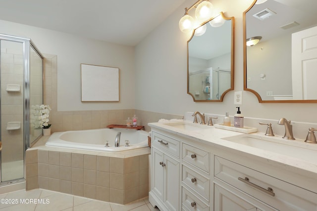 408 April Way, Middletown, NJ 07748 - bathroom with double vanity, a stall shower, a bath, and tile patterned floors