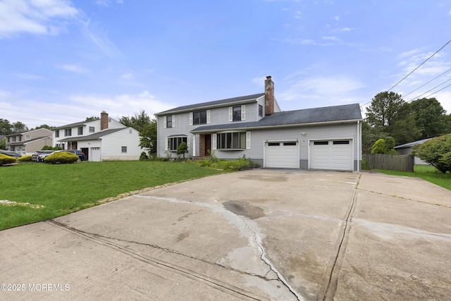 444 Pfister Rd, Jackson, NJ 08527 - traditional home with concrete driveway, a garage, and a chimney