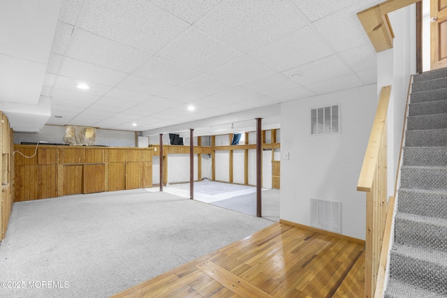444 Pfister Rd, Jackson, NJ 08527 - finished basement with stairway, a paneled ceiling, wood finished floors, and recessed lighting
