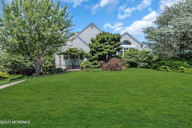 16 Arrowhead Way, Millstone, NJ 08535 - view of property hidden behind natural elements featuring a front lawn