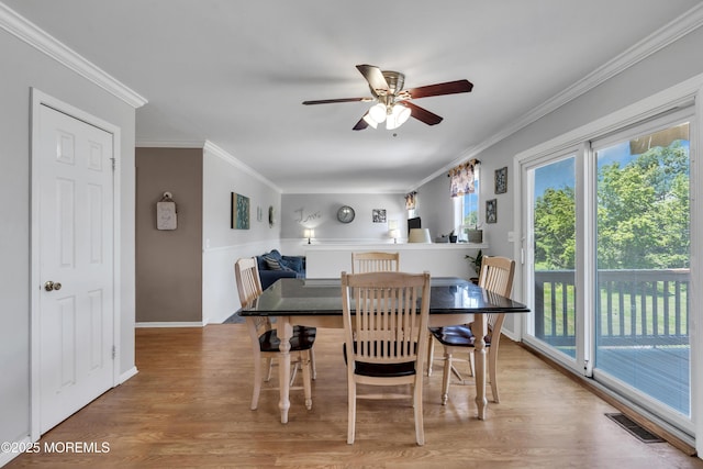 16 Arrowhead Way, Millstone, NJ 08535 - dining space with a ceiling fan, light wood-style flooring, and ornamental molding