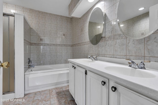 16 Arrowhead Way, Millstone, NJ 08535 - full bathroom with double vanity, tile patterned floors, and tile walls