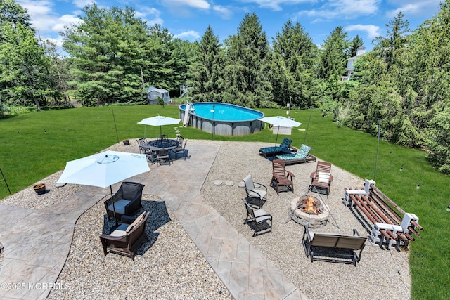 16 Arrowhead Way, Millstone, NJ 08535 - view of patio / terrace with an outdoor fire pit and an outdoor pool