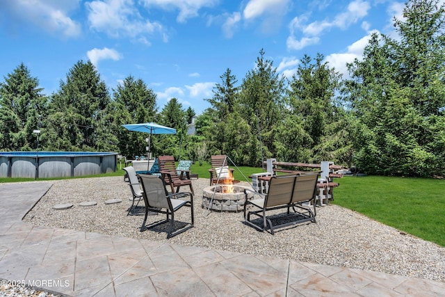 16 Arrowhead Way, Millstone, NJ 08535 - view of patio / terrace with an outdoor fire pit and an outdoor pool