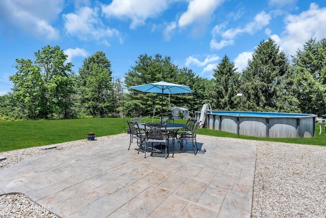 16 Arrowhead Way, Millstone, NJ 08535 - view of patio featuring outdoor dining space and an outdoor pool