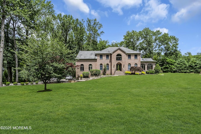 2 Shady Oak Ct, Millstone, NJ 08535 - view of front of house featuring a front lawn and brick siding