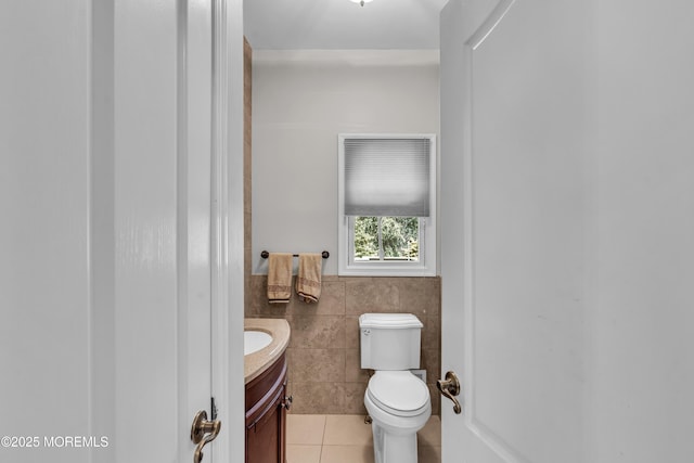 2 Shady Oak Ct, Millstone, NJ 08535 - bathroom with tile walls, tile patterned flooring, vanity, and a wainscoted wall