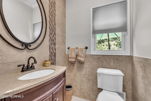 2 Shady Oak Ct, Millstone, NJ 08535 - bathroom featuring tile walls, vanity, and wainscoting