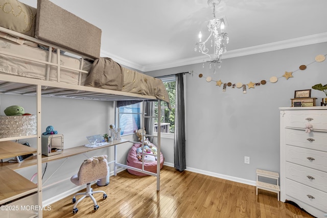 2 Shady Oak Ct, Millstone, NJ 08535 - bedroom featuring ornamental molding, wood finished floors, and a chandelier