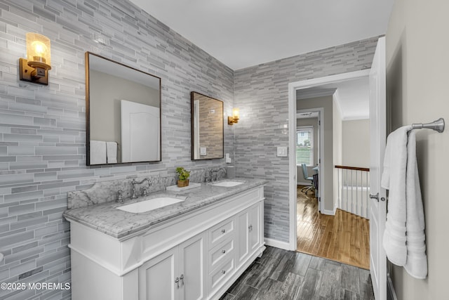 2 Shady Oak Ct, Millstone, NJ 08535 - full bathroom with double vanity, tile walls, wood finished floors, and ornamental molding
