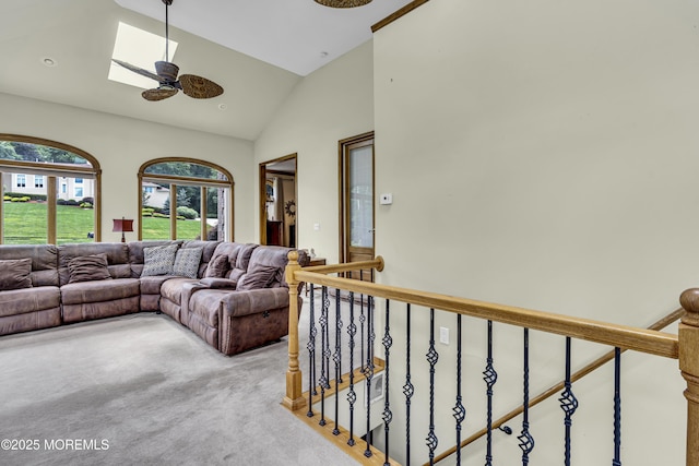 2 Shady Oak Ct, Millstone, NJ 08535 - carpeted living area featuring a ceiling fan, a skylight, and high vaulted ceiling