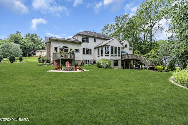 2 Shady Oak Ct, Millstone, NJ 08535 - rear view of house featuring a fire pit, a deck, stairs, and a lawn