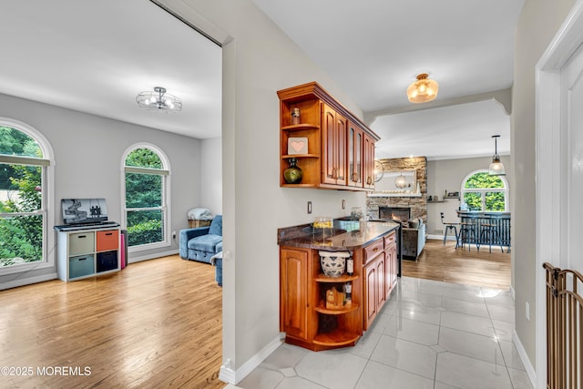 2 Shady Oak Ct, Millstone, NJ 08535 - kitchen with open shelves, plenty of natural light, and brown cabinetry