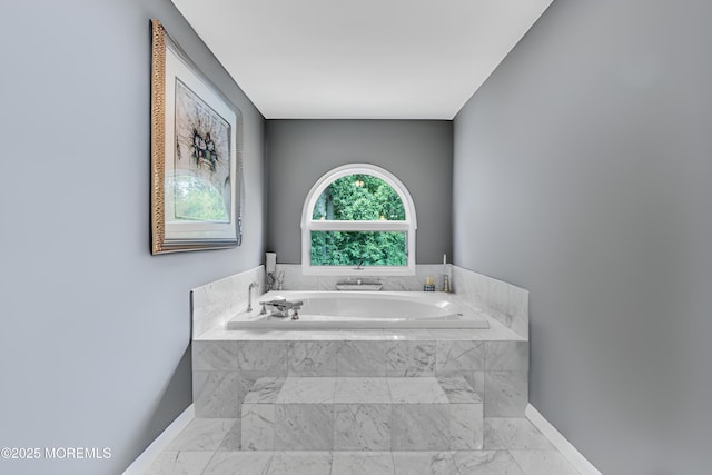 2 Shady Oak Ct, Millstone, NJ 08535 - bathroom featuring a garden tub and marble look tile flooring