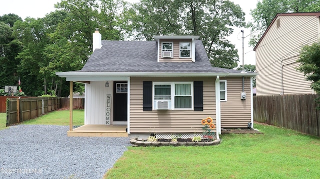 17 Mayfair Ct, Brick, NJ 08723 - bungalow-style house featuring a chimney, a fenced backyard, a shingled roof, and a porch