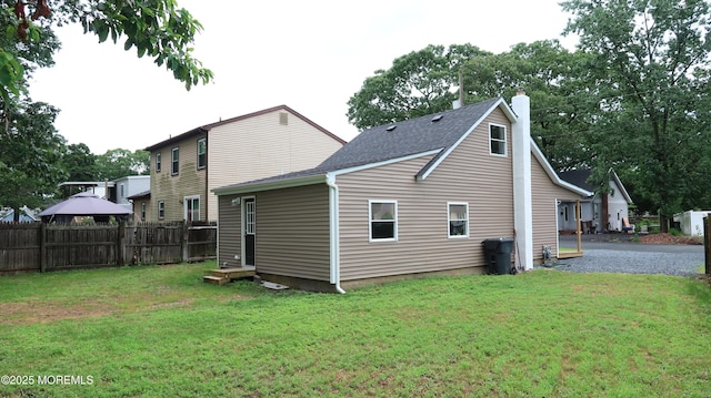 17 Mayfair Ct, Brick, NJ 08723 - back of house with a chimney and a shingled roof