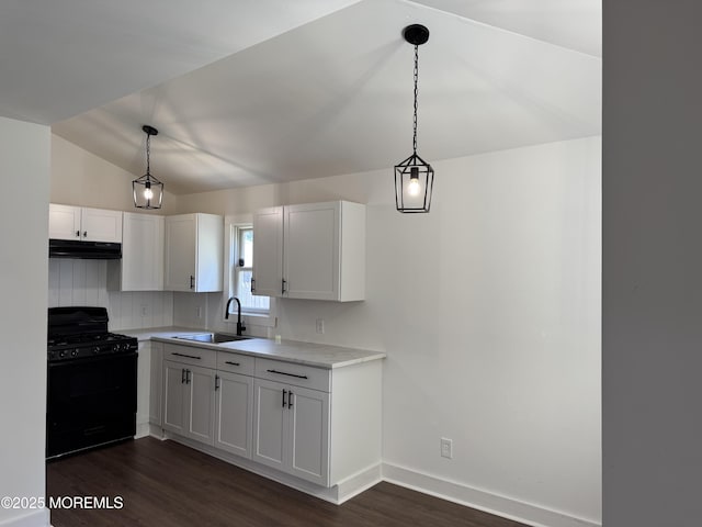 17 Mayfair Ct, Brick, NJ 08723 - kitchen featuring black range with gas cooktop, under cabinet range hood, dark wood-style flooring, light countertops, and white cabinets