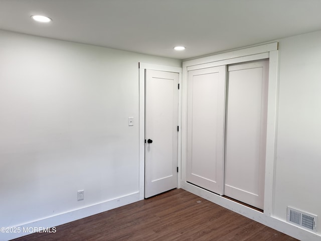 17 Mayfair Ct, Brick, NJ 08723 - unfurnished bedroom featuring dark wood-style flooring, recessed lighting, and a closet