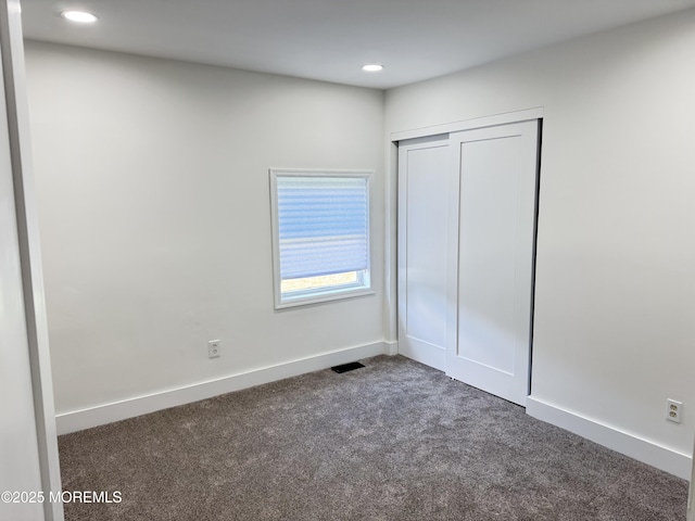 17 Mayfair Ct, Brick, NJ 08723 - unfurnished bedroom with dark colored carpet, recessed lighting, and a closet