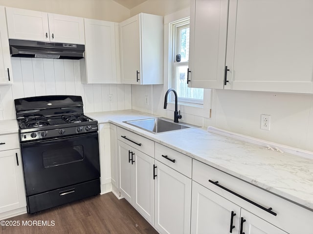 17 Mayfair Ct, Brick, NJ 08723 - kitchen with black gas range, under cabinet range hood, white cabinets, and dark wood-style flooring