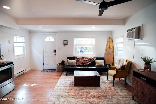1730 Newman St, Belmar, NJ 07719 - living area with plenty of natural light, wood finished floors, recessed lighting, a ceiling fan, and a baseboard heating unit