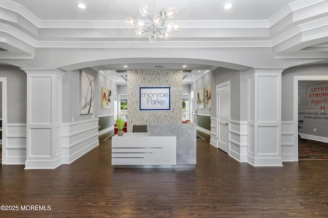 28202 Radford Ct, Monroe, NJ 08831 - reception with recessed lighting, arched walkways, decorative columns, a chandelier, and ornamental molding