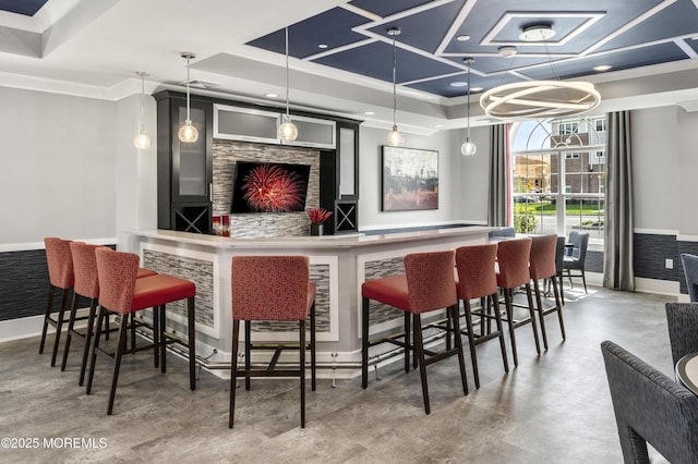 28202 Radford Ct, Monroe, NJ 08831 - indoor dry bar featuring crown molding, concrete floors, and decorative light fixtures