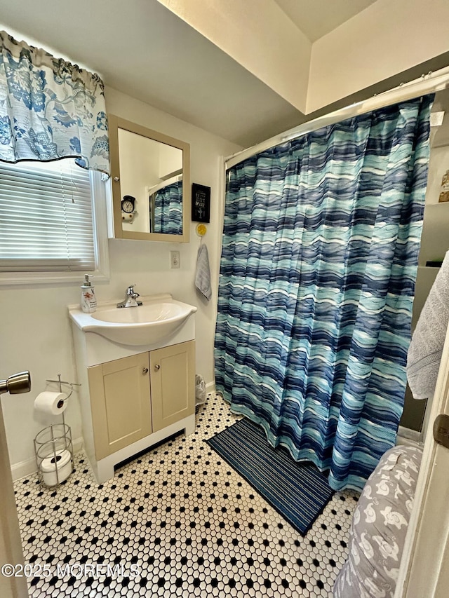 38 Crescent St, Keansburg, NJ 07734 - full bath with vanity, curtained shower, and tile patterned floors