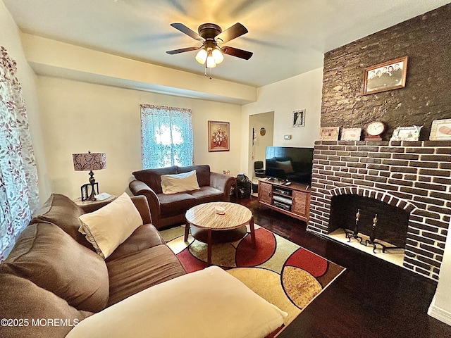 38 Crescent St, Keansburg, NJ 07734 - living room with dark wood-type flooring, ceiling fan, and a fireplace