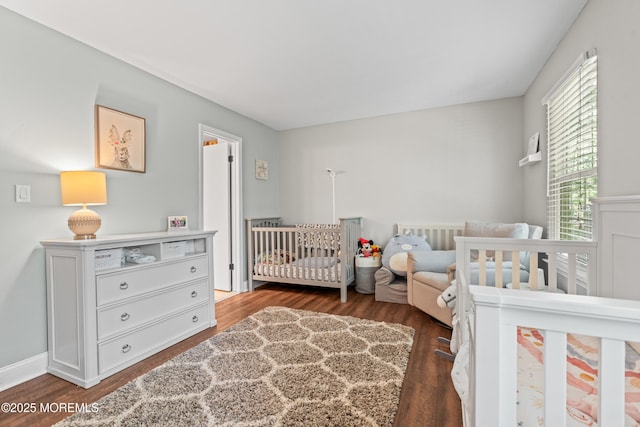 7 Steeple Chase Ct, Tinton Falls, NJ 07724 - bedroom with wood finished floors and a crib