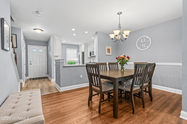 7 Steeple Chase Ct, Tinton Falls, NJ 07724 - dining space featuring a chandelier, light wood-style floors, and recessed lighting