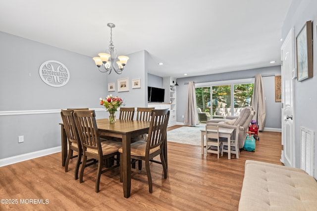 7 Steeple Chase Ct, Tinton Falls, NJ 07724 - dining space with a chandelier, light wood-style flooring, and recessed lighting
