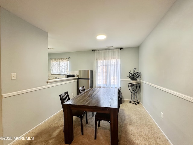 148 Delaware Trl, Lakewood, NJ 08701 - carpeted dining area with baseboards