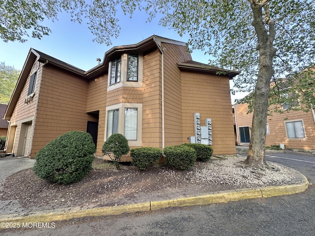 148 Delaware Trl, Lakewood, NJ 08701 - view of side of property with a garage
