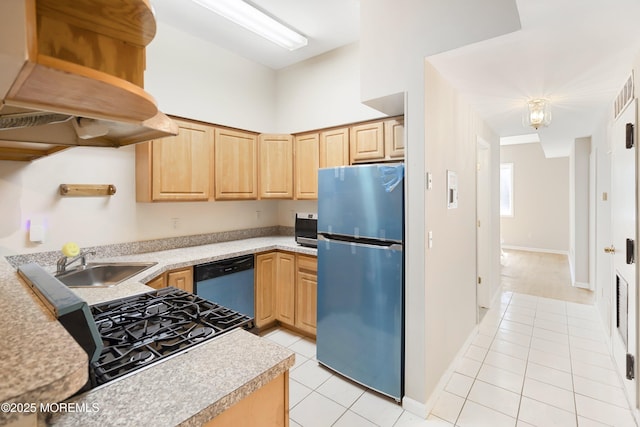 200 Paterson Plank Rd Unit 302, Union City, NJ 07087 - kitchen featuring stainless steel appliances, light brown cabinets, light tile patterned flooring, and light countertops