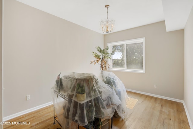 200 Paterson Plank Rd Unit 302, Union City, NJ 07087 - bedroom featuring a chandelier and light wood-style flooring