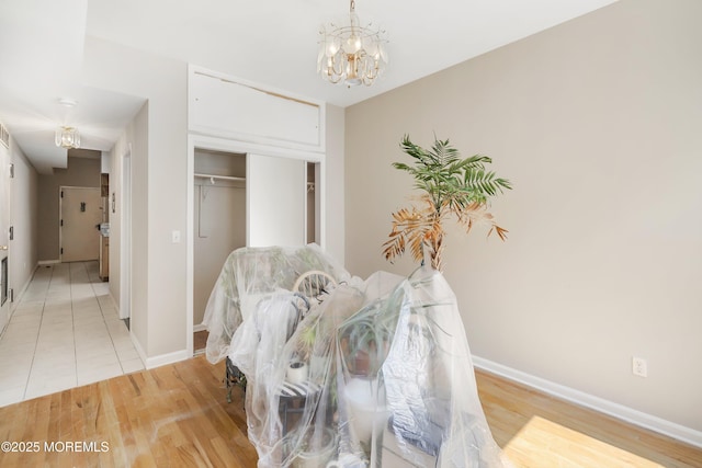 200 Paterson Plank Rd Unit 302, Union City, NJ 07087 - sitting room featuring a chandelier and light wood-style flooring