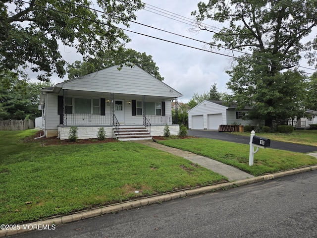 10 Weston Pl, Eatontown, NJ 07724 - bungalow-style home featuring a porch, a garage, and an outbuilding